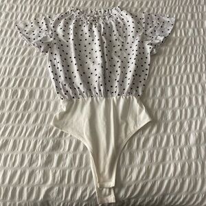 White and black polka dot bodysuit #polkadot